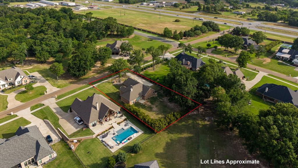 101 Lighthouse Lane Mabank, TX 75143 - Photo 35 of 40 Aerial perspective of a suburban property with established landscaping