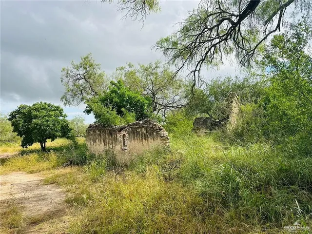 a view of lake with mountain in the back