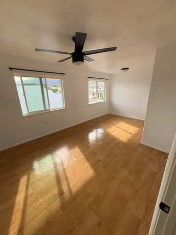 a view of an empty room and window