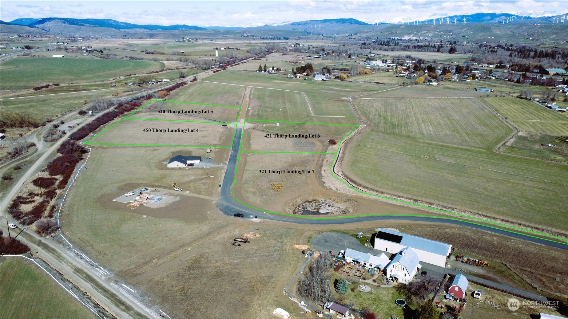 421 Thorp Landing Lane Thorp, WA 98946 - Photo 1 of 10 an aerial view of a house with a lake view