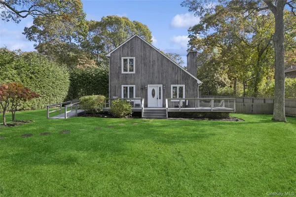 a house view with a garden space