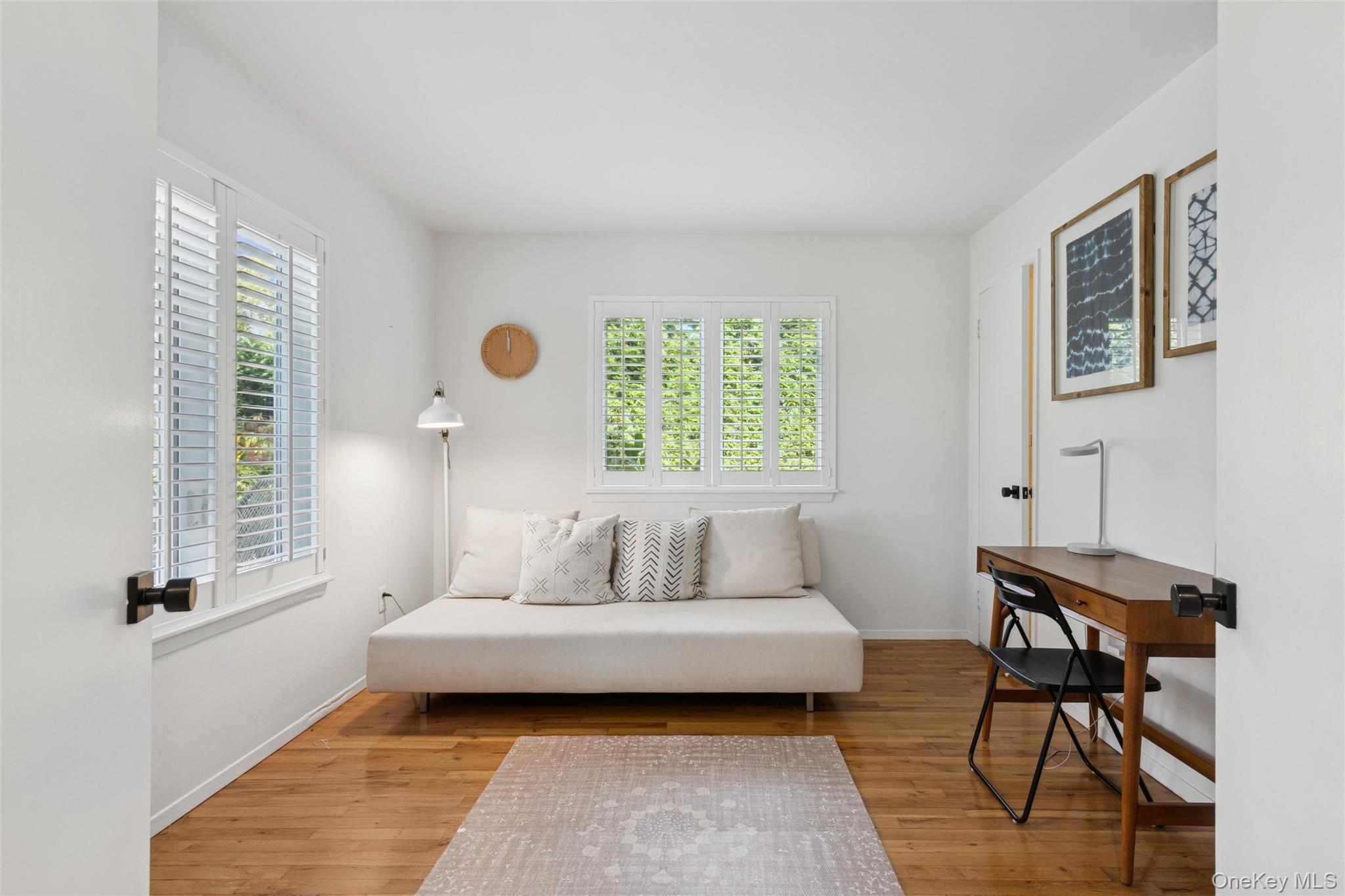 4 Morris Court Westhampton Beach, NY 11978 - Photo 16 of 28 a bedroom with furniture and a window