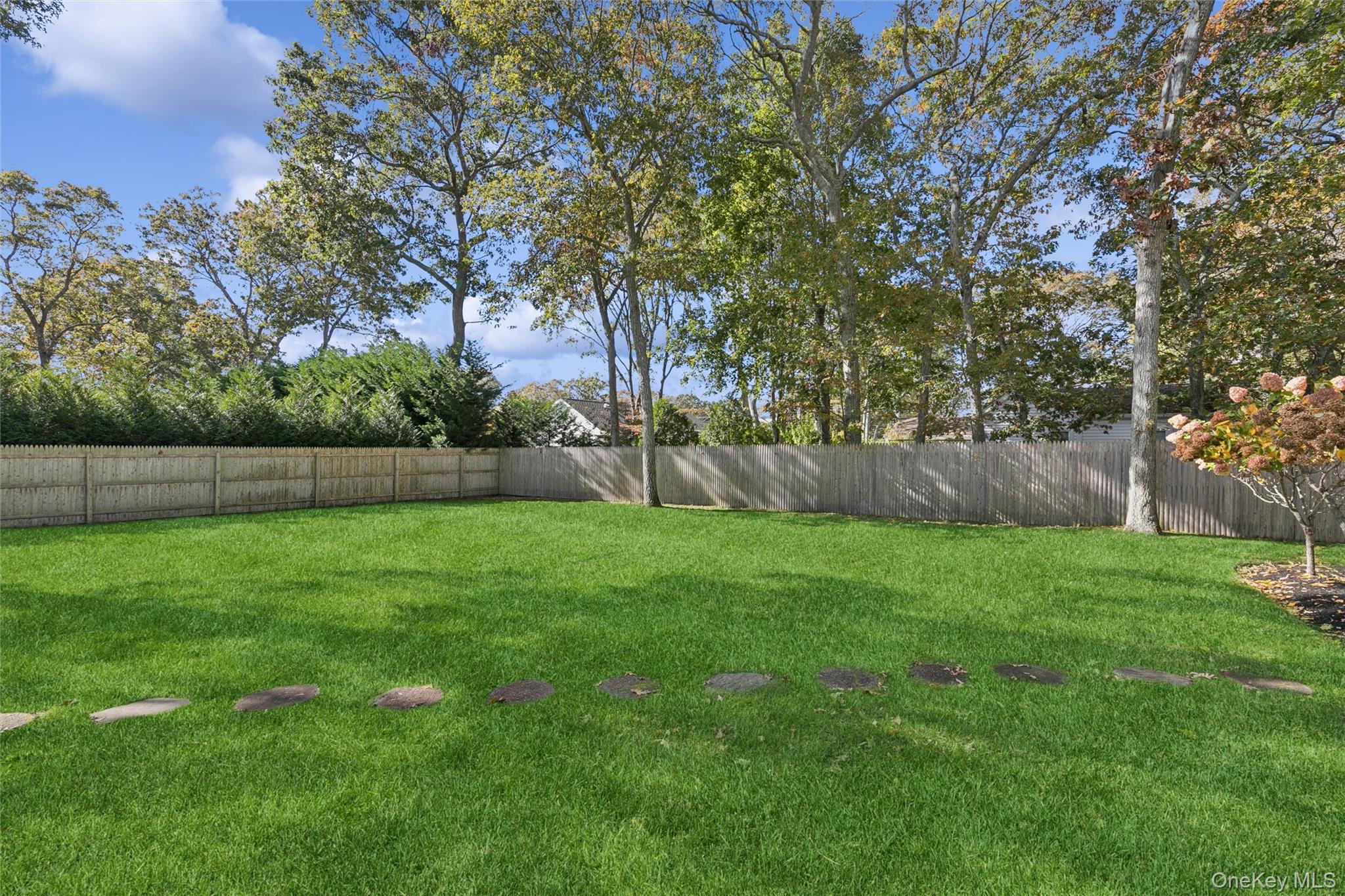 4 Morris Court Westhampton Beach, NY 11978 - Photo 27 of 28 a view of yard with green space