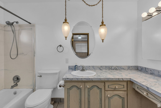 10705 Green Ridge Drive Sandy, UT 84070 - Photo 17 of 55 Bathroom featuring vanity and bathtub / shower combination