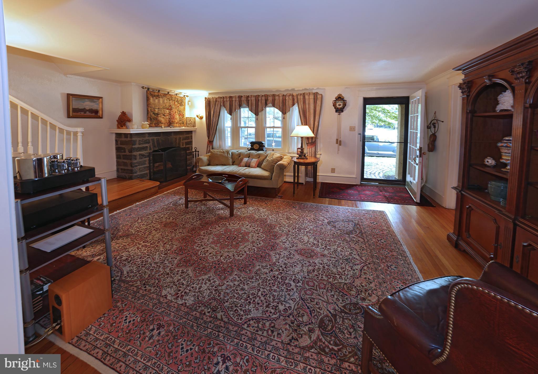 22 Eldon Road Lansdowne, PA 19050 - Photo 7 of 30 Living Room w/ HW Floors & Fireplace