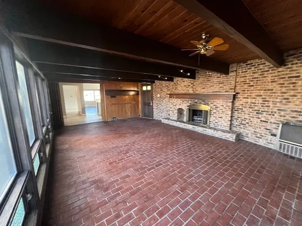 a room with furniture and a fireplace
