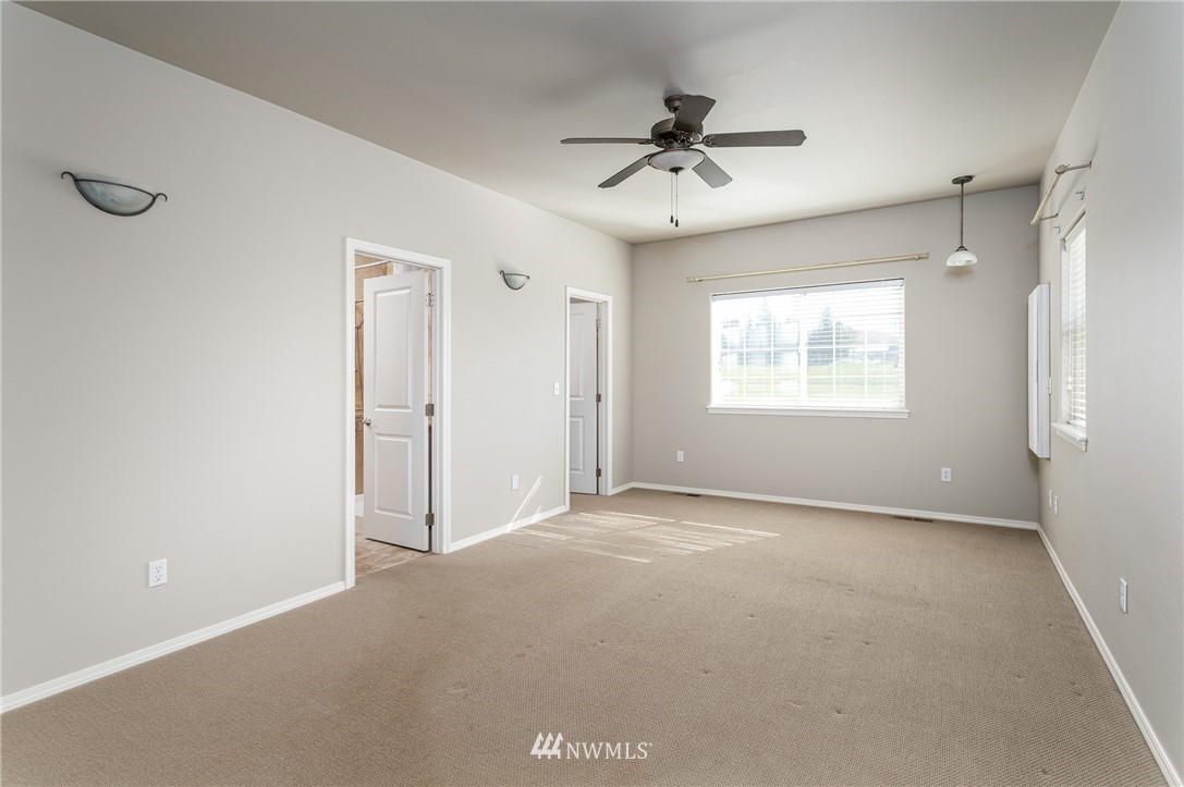 704 Firing Center Road Yakima, WA 98901 - Photo 17 of 29 a view of an empty room with a window