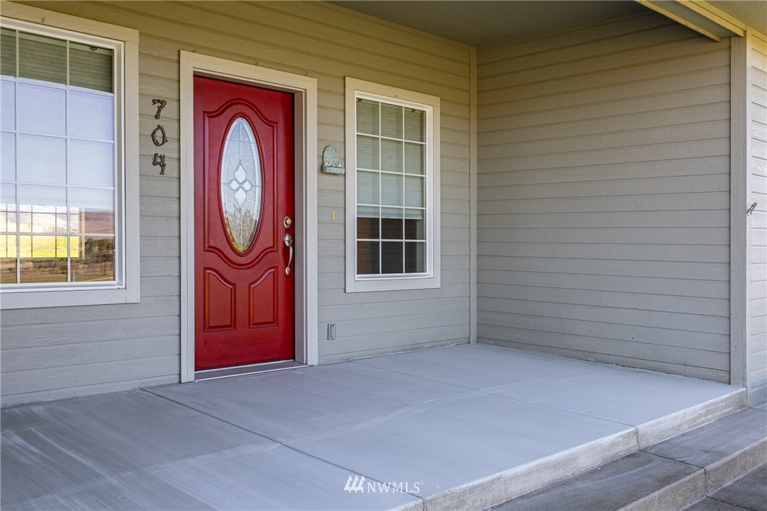 704 Firing Center Road Yakima, WA 98901 - Photo 6 of 29 a front view of a house with entryway