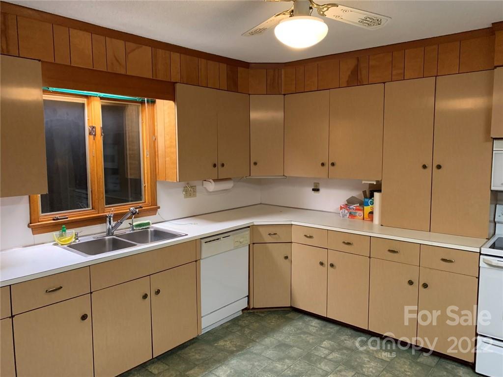3170 Spring Garden Road, Unit 112 Claremont, NC 28610 - Photo 12 of 36 a spacious bathroom with a double vanity sink and a mirror