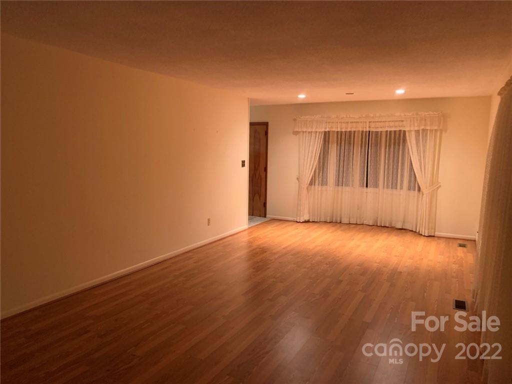 3170 Spring Garden Road, Unit 112 Claremont, NC 28610 - Photo 14 of 36 a view of an empty room