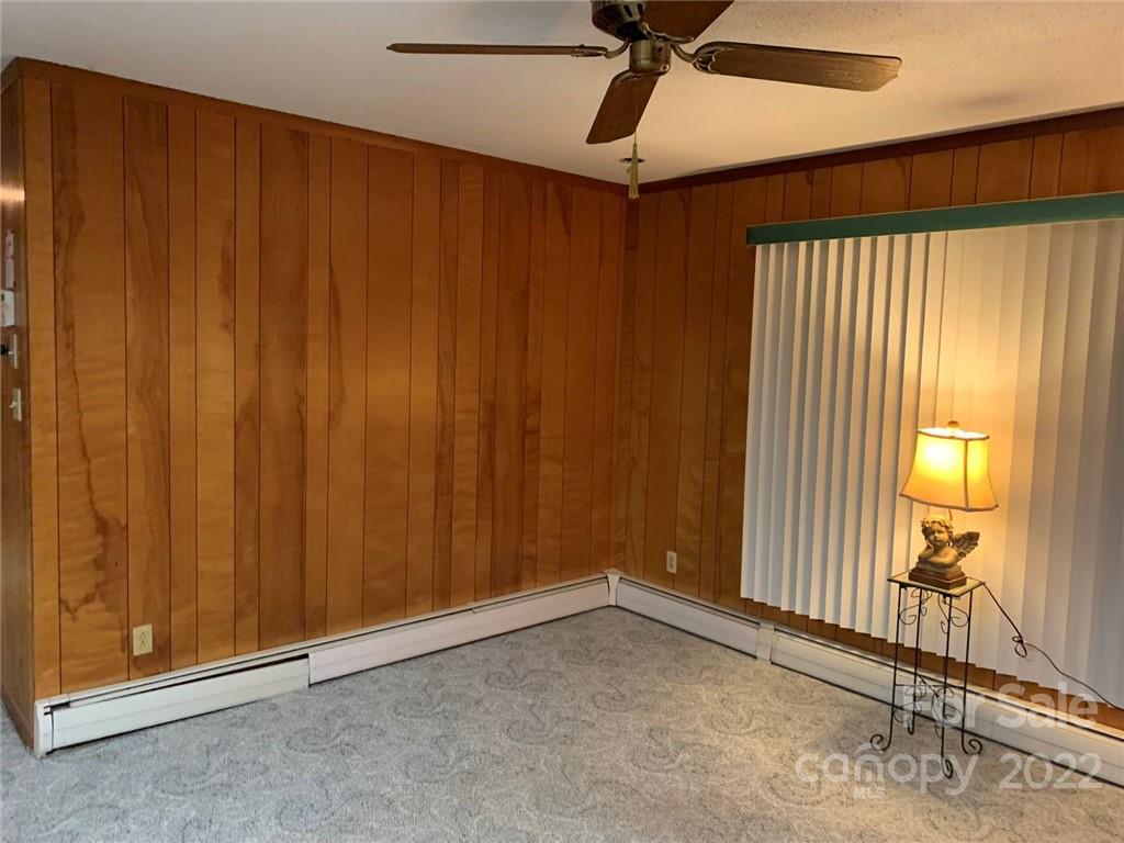 3170 Spring Garden Road, Unit 112 Claremont, NC 28610 - Photo 17 of 36 a view of an empty room and a window
