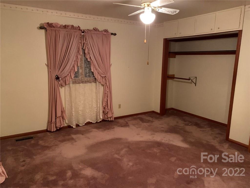 3170 Spring Garden Road, Unit 112 Claremont, NC 28610 - Photo 20 of 36 wooden floor in a hall