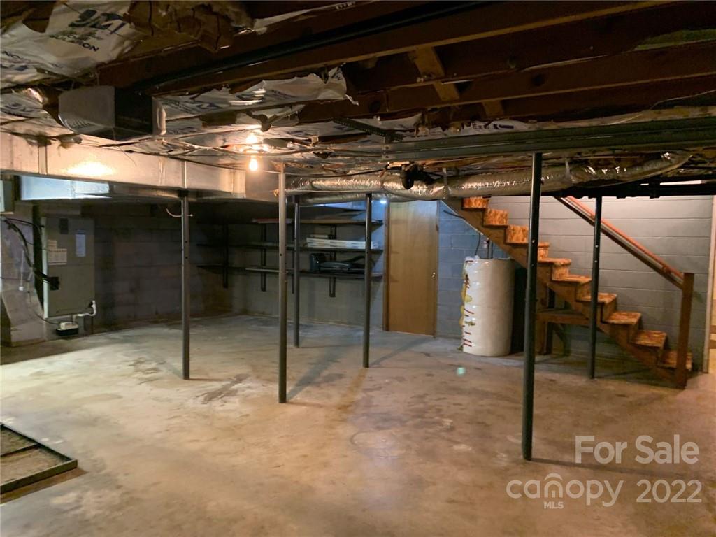 3170 Spring Garden Road, Unit 112 Claremont, NC 28610 - Photo 33 of 36 a view of empty room with wooden floor