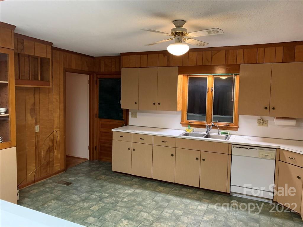 3170 Spring Garden Road, Unit 112 Claremont, NC 28610 - Photo 10 of 36 a spacious bathroom with a double vanity sink and a mirror