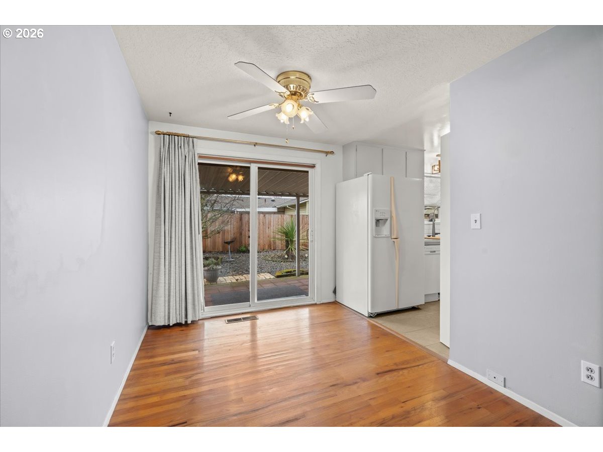 1386 Umpqua Road Woodburn, OR 97071 - Photo 10 of 32 a view interior of the house with wooden floor
