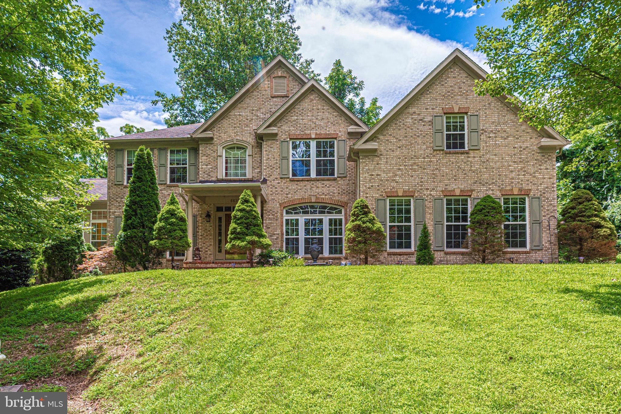6636 South Clifton Road Frederick, MD 21703 - Photo 64 of 81 a front view of a house with a yard