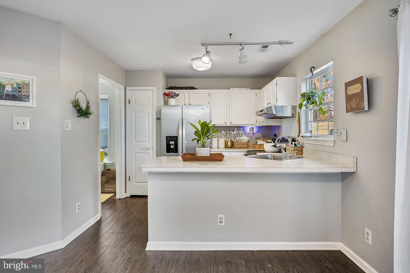 72 Pondview Lane Sicklerville, NJ 08081 - Photo 12 of 34 a view of living room with stainless steel appliances granite countertop furniture and a view of kitchen