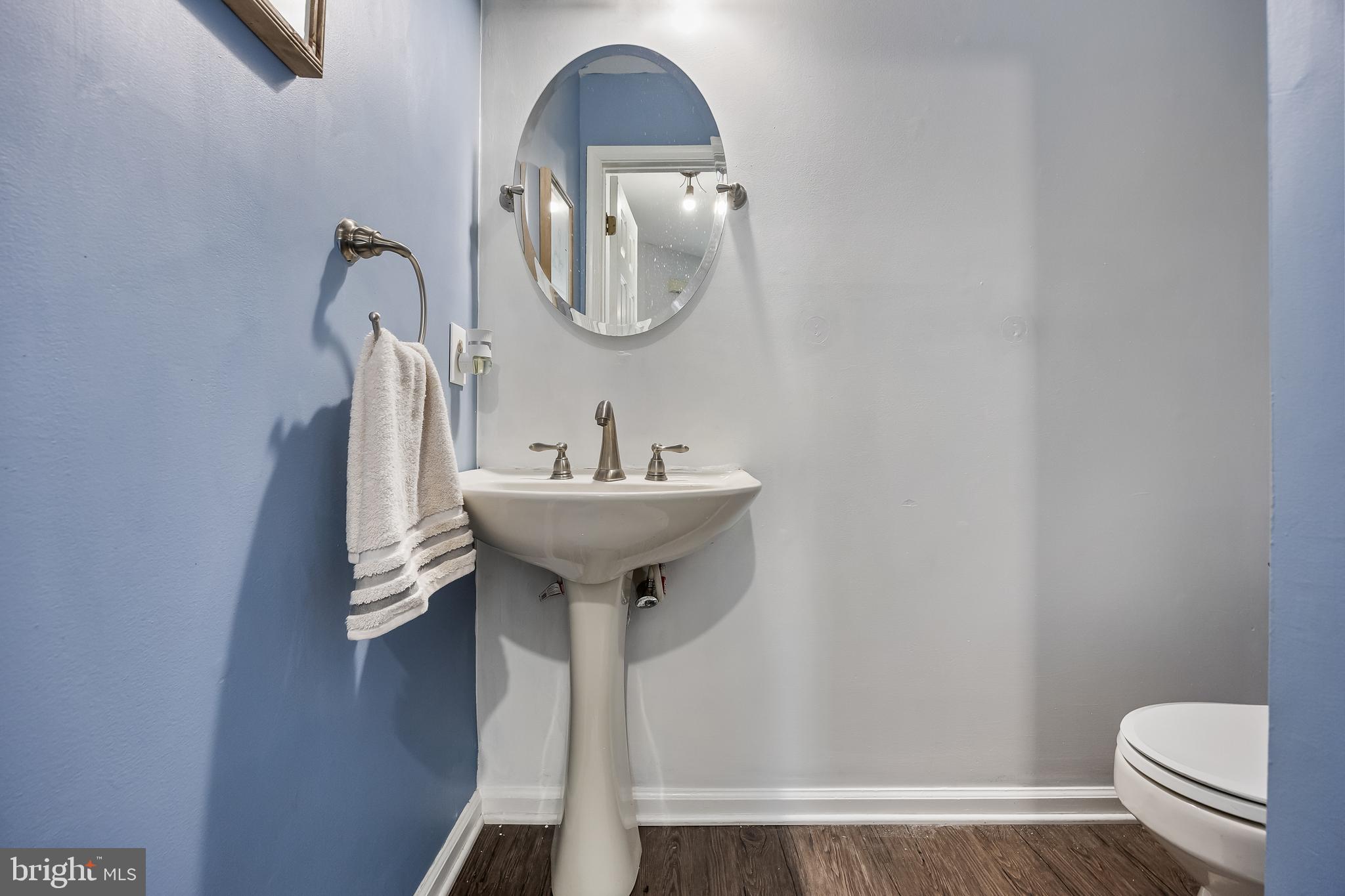 72 Pondview Lane Sicklerville, NJ 08081 - Photo 18 of 34 a bathroom with a sink toilet and a mirror