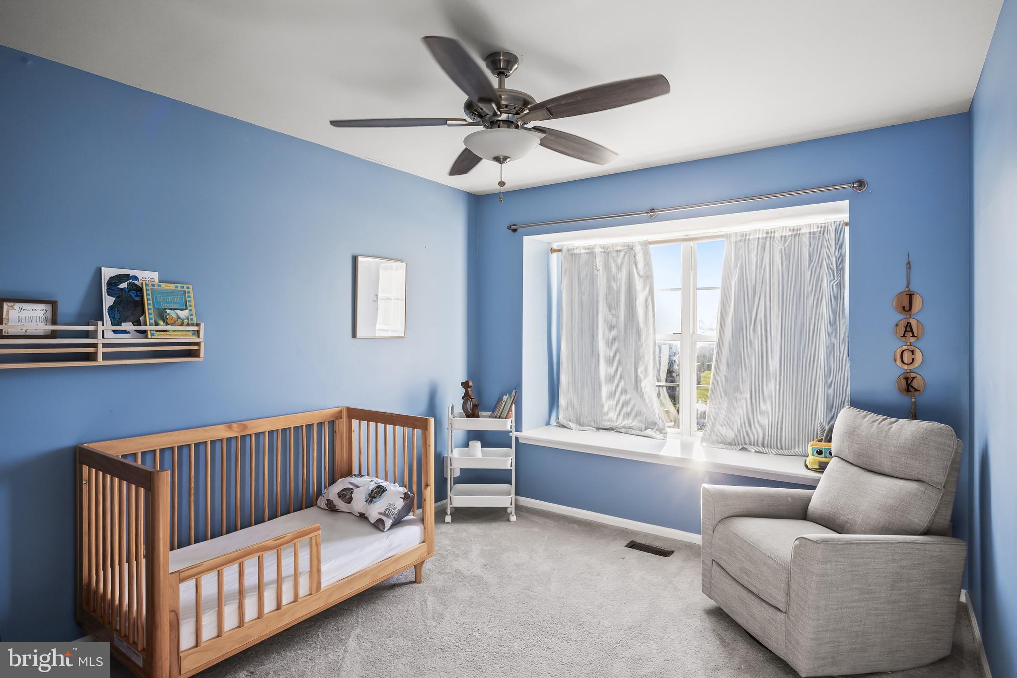 72 Pondview Lane Sicklerville, NJ 08081 - Photo 23 of 34 a bedroom with furniture and a large window