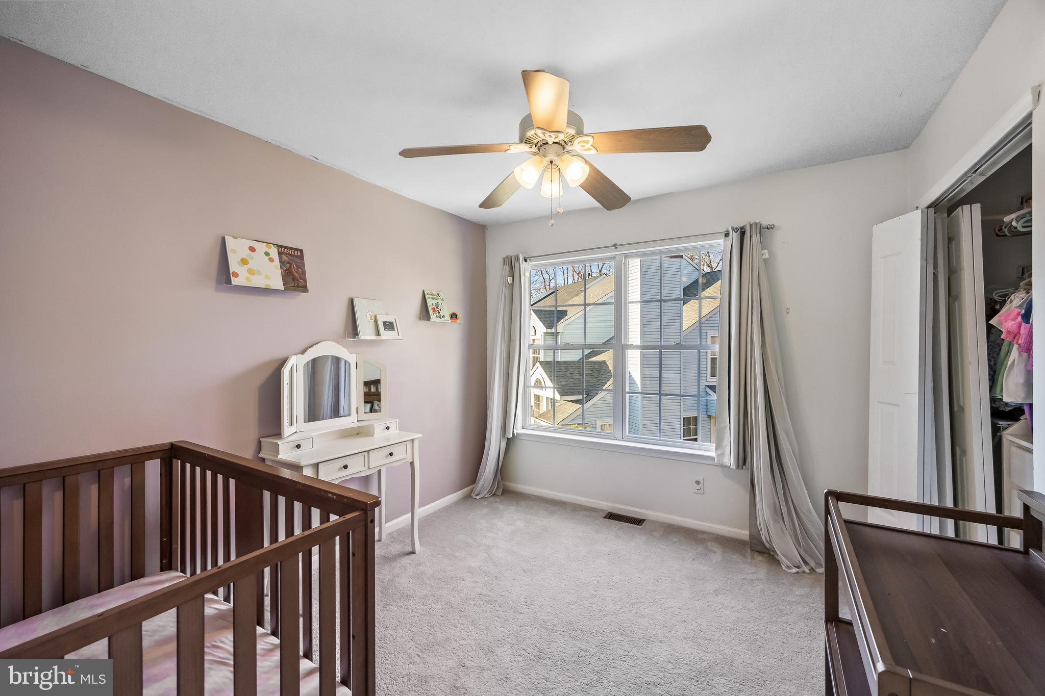 72 Pondview Lane Sicklerville, NJ 08081 - Photo 24 of 34 a view of an empty room with window and kitchen view