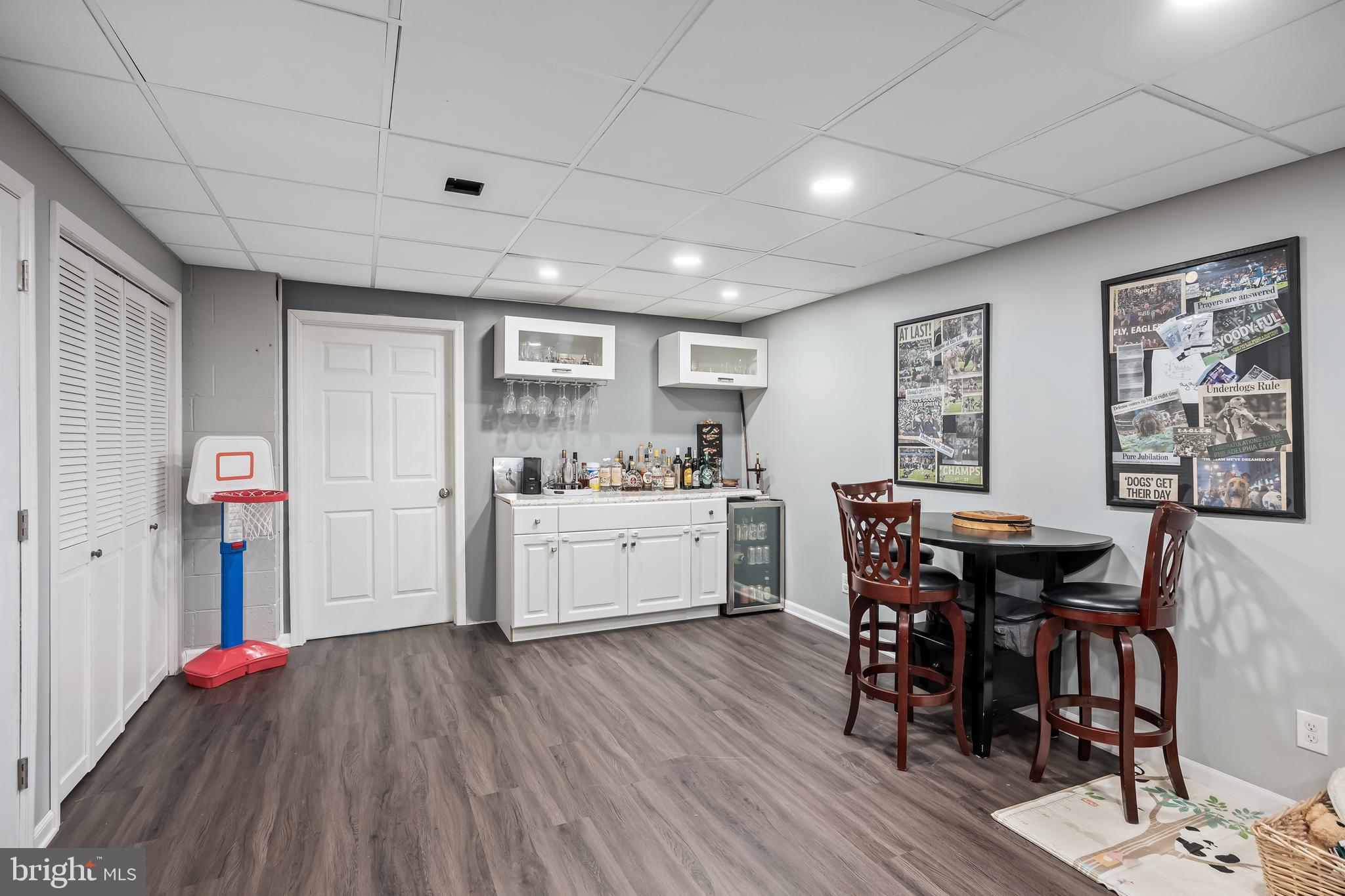 72 Pondview Lane Sicklerville, NJ 08081 - Photo 27 of 34 a kitchen with stainless steel appliances kitchen island granite countertop a table chairs sink and cabinets