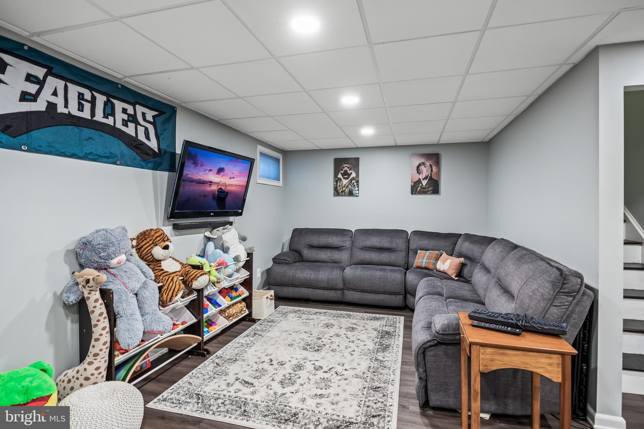 72 Pondview Lane Sicklerville, NJ 08081 - Photo 28 of 34 a living room with furniture and a flat screen tv