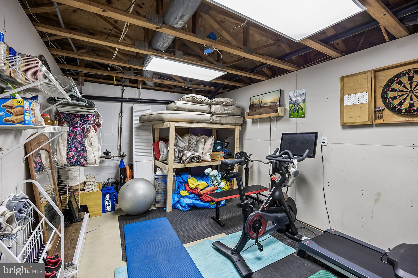 72 Pondview Lane Sicklerville, NJ 08081 - Photo 29 of 34 a view of a storage room with furniture basket and windows