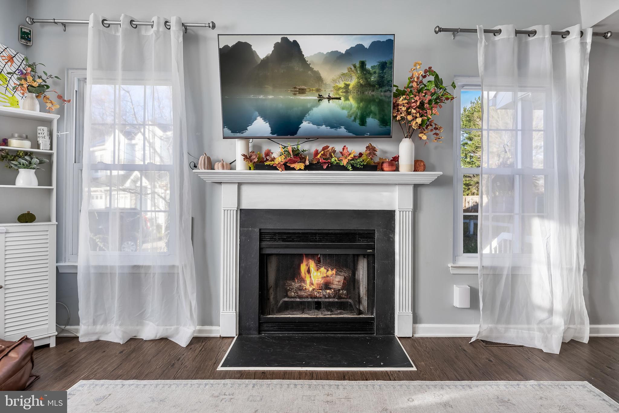 72 Pondview Lane Sicklerville, NJ 08081 - Photo 8 of 34 a living room with furniture and a fireplace