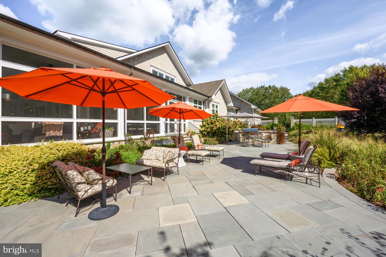 7508 Cooper Point Road Bozman, MD 21612 - Photo 23 of 116 Blue stone patio with built-in outdoor kitchen