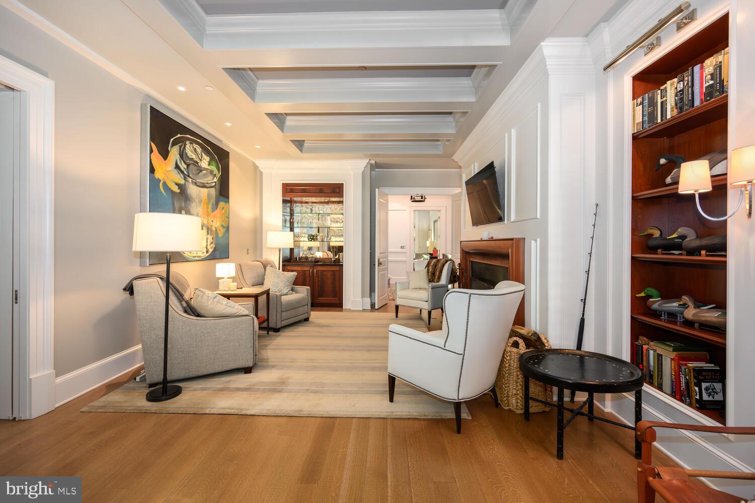 7508 Cooper Point Road Bozman, MD 21612 - Photo 69 of 116 a living room with furniture and a flat screen tv