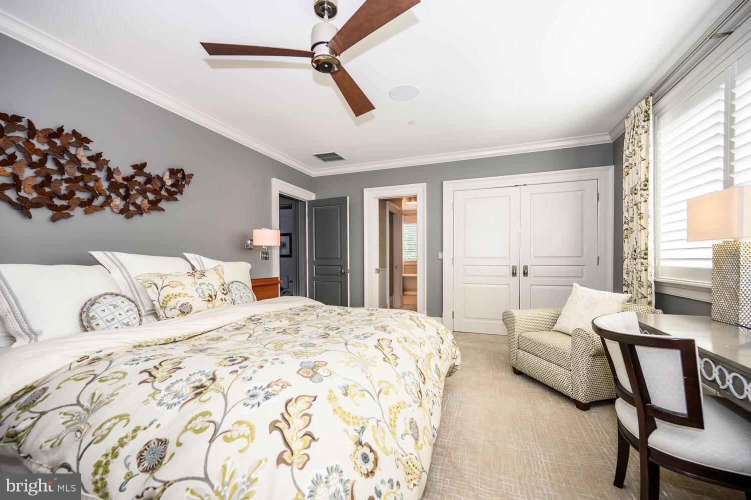 7508 Cooper Point Road Bozman, MD 21612 - Photo 97 of 116 a bedroom with a large bed and a window