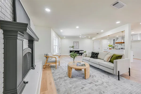 a living room with furniture and a table