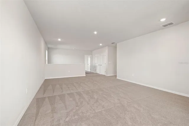 a view of hallway with closet