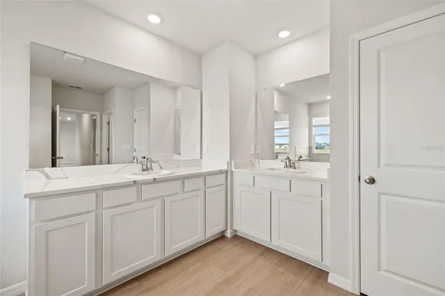 a white bath tub sitting in a bathroom