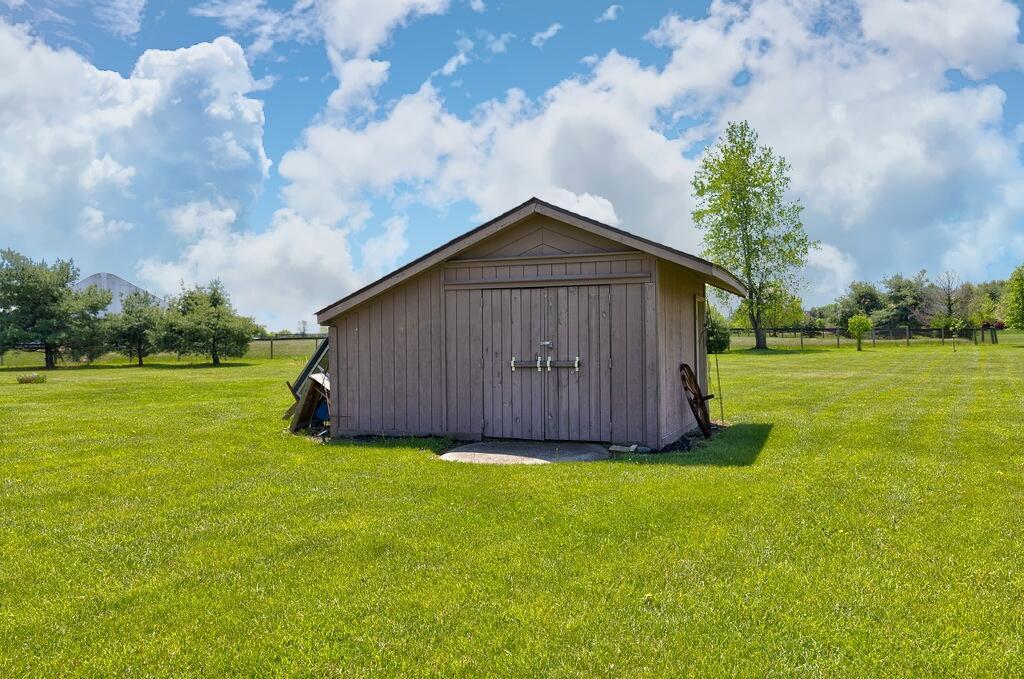 1300 Hubbard Road Galloway, OH 43119 - Photo 56 of 89 • Wood flooring • Loft area • Main door • Separate pool storage area