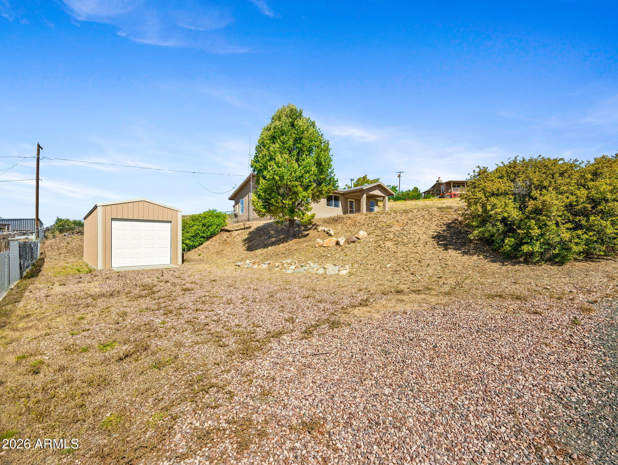 18420 Peeples Valley Road Peeples Valley, AZ 86332 - Photo 27 of 31 a street view with mountain view