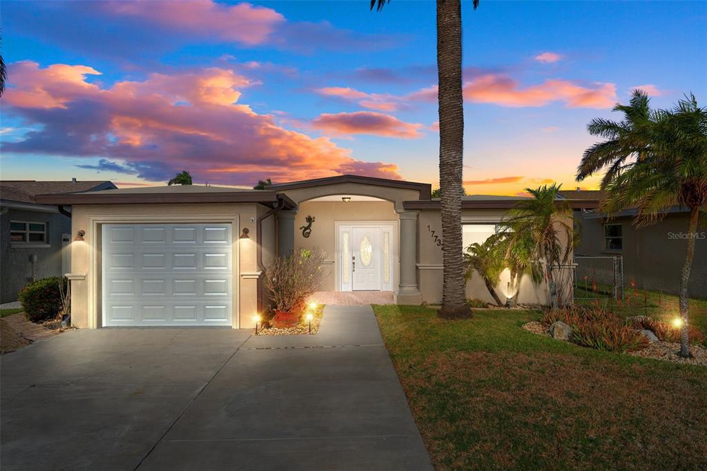 17732 Long Point Drive Redington Shores, FL 33708 - Photo 1 of 1 a view of a house with a backyard