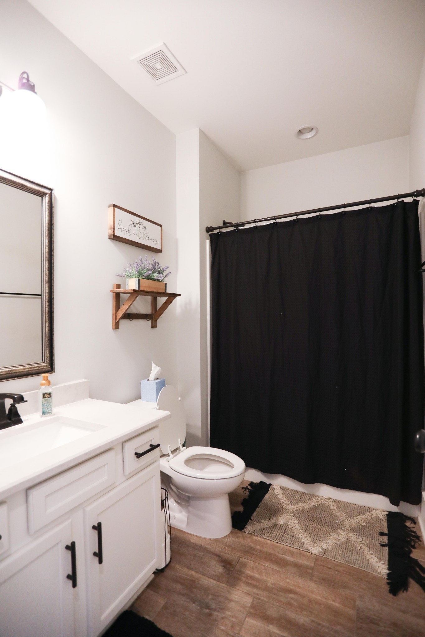 119 Vanner Road Mount Juliet, TN 37122 - Photo 18 of 44 a bathroom with a sink and a mirror