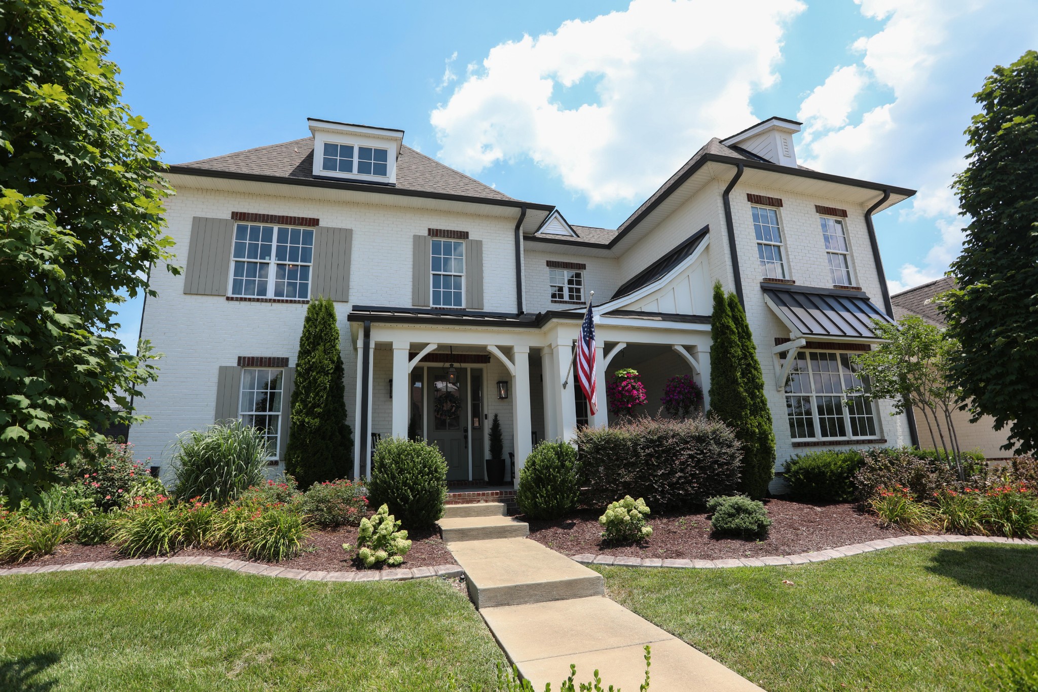119 Vanner Road Mount Juliet, TN 37122 - Photo 2 of 44 a front view of a house with a garden