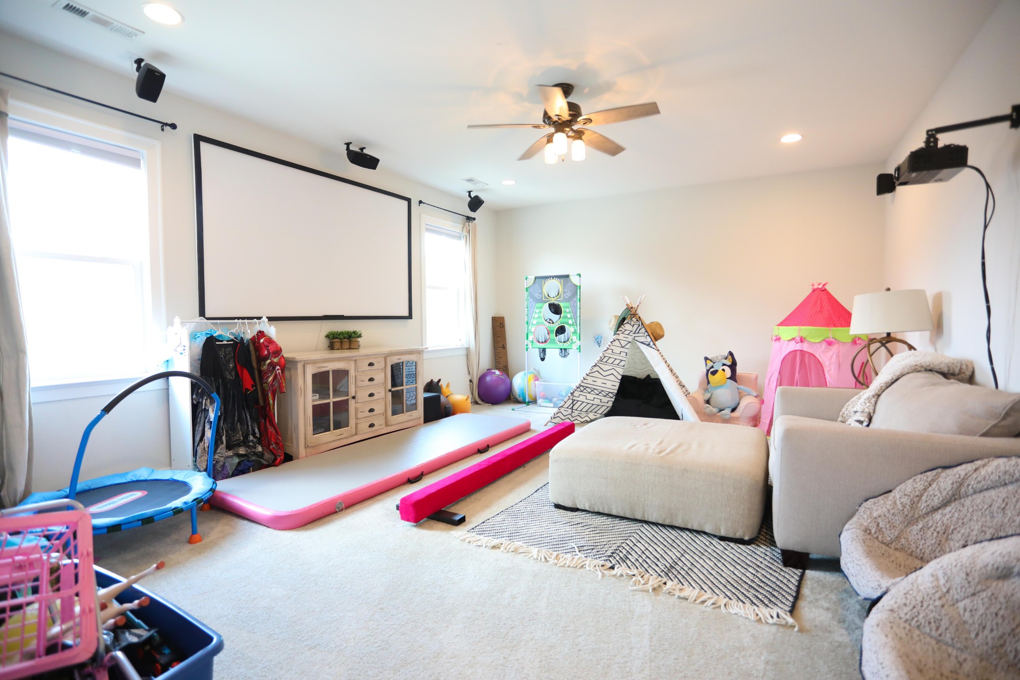 119 Vanner Road Mount Juliet, TN 37122 - Photo 27 of 44 a living room with furniture gym equipment and a flat screen tv