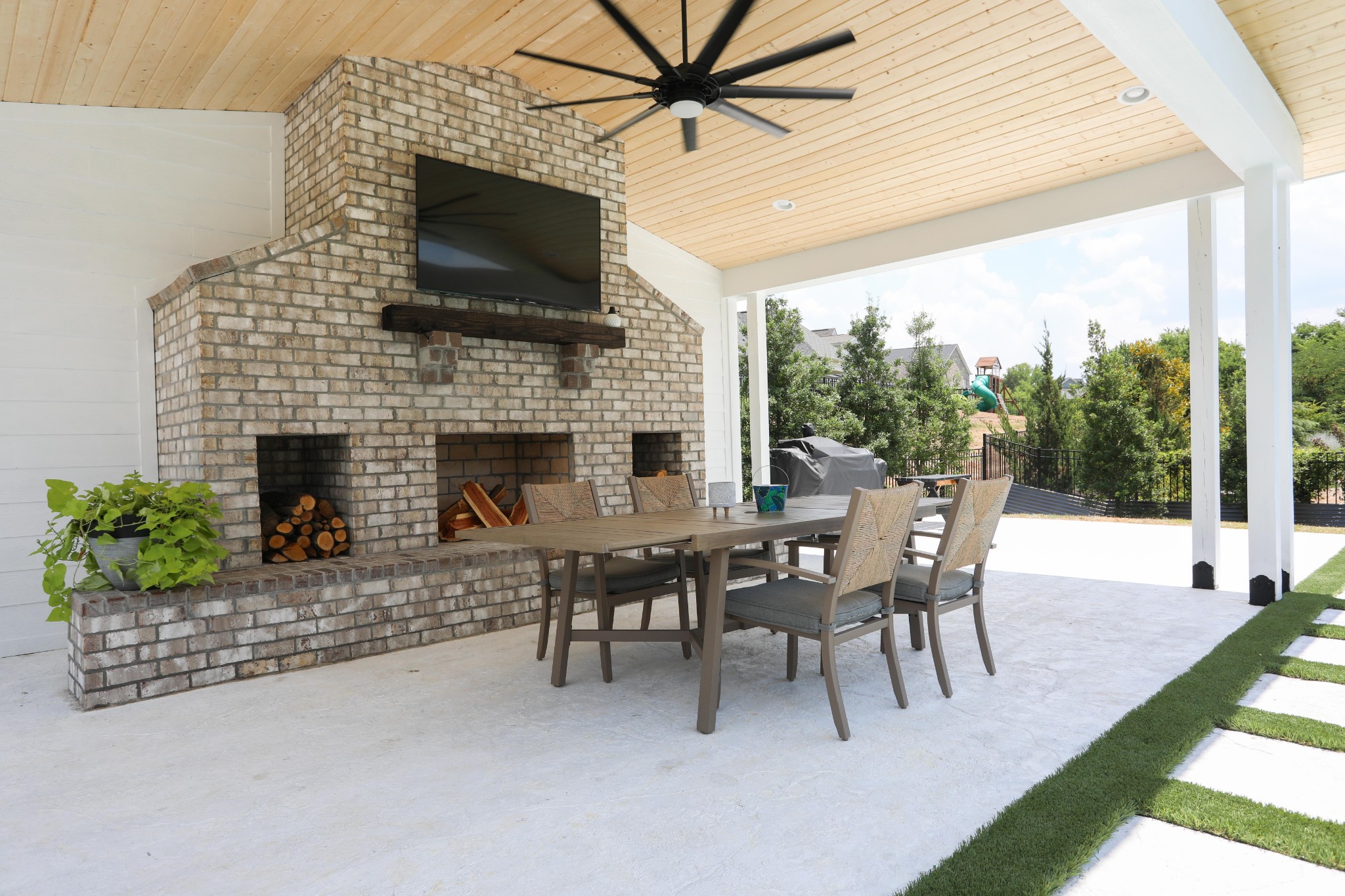 119 Vanner Road Mount Juliet, TN 37122 - Photo 37 of 44 a living room with furniture a flat screen tv and a fireplace