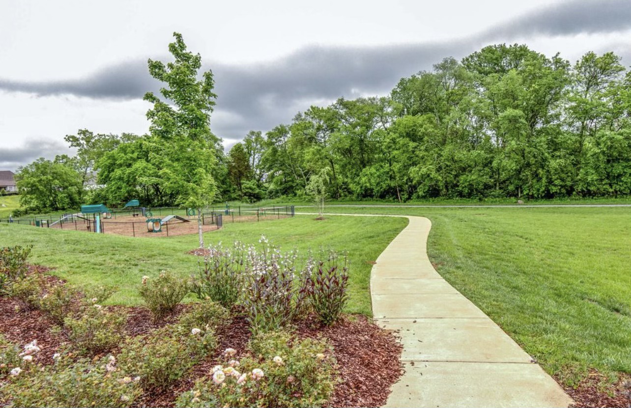 119 Vanner Road Mount Juliet, TN 37122 - Photo 39 of 44 a view of a garden with a fountain