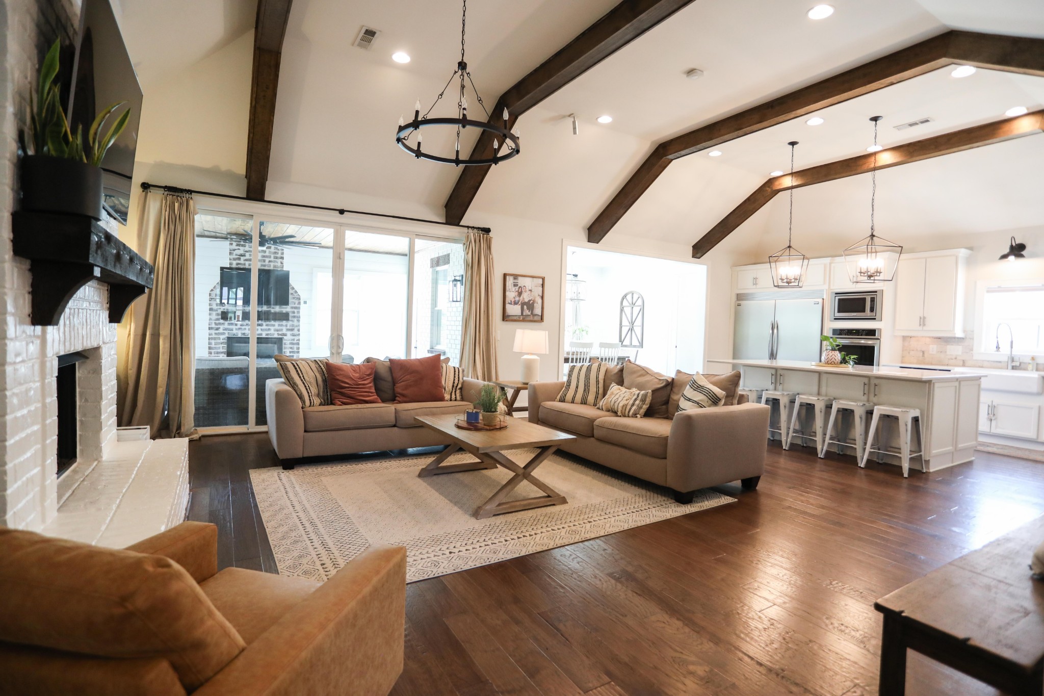 119 Vanner Road Mount Juliet, TN 37122 - Photo 8 of 44 a living room with furniture a ceiling fan and a flat screen tv