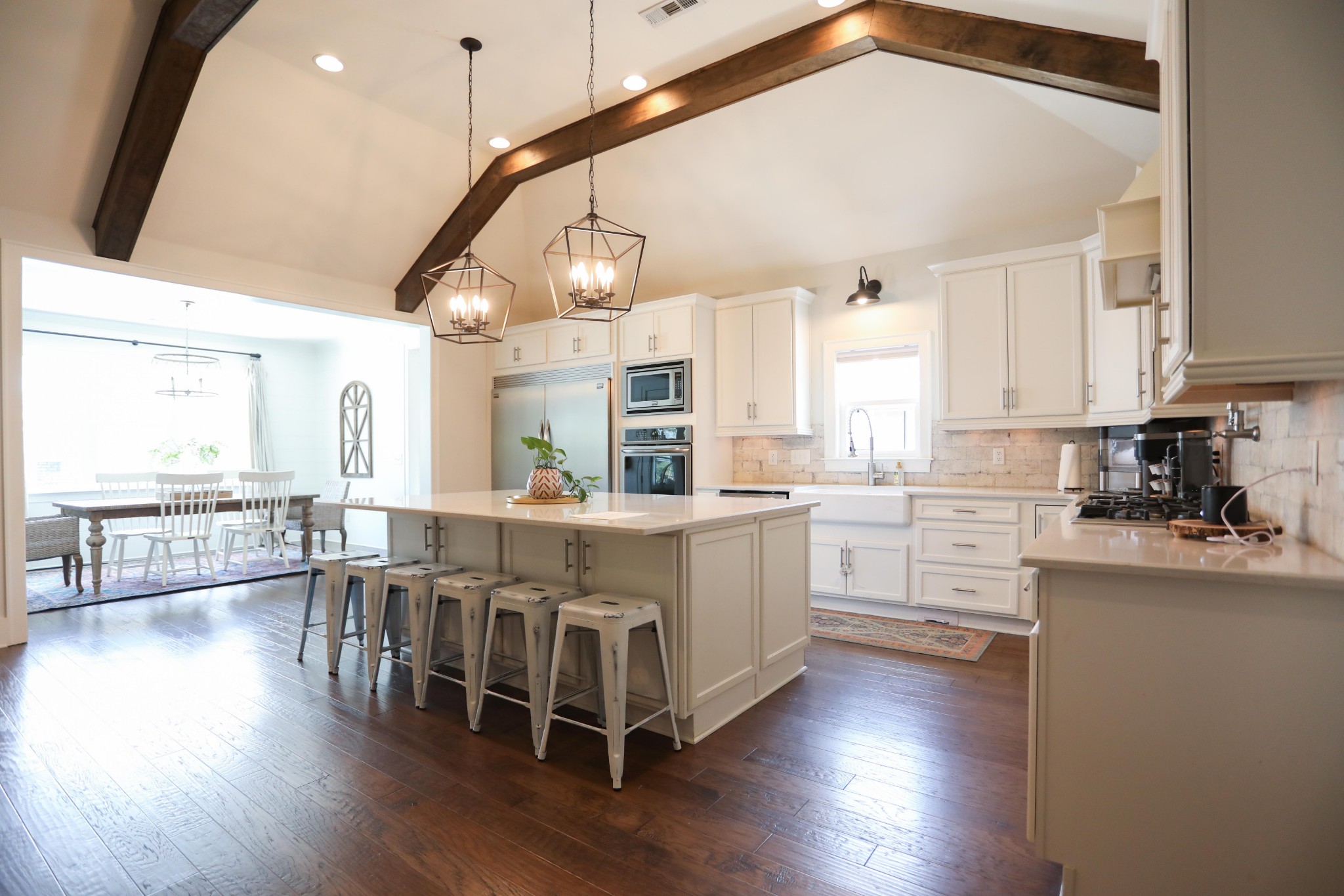 119 Vanner Road Mount Juliet, TN 37122 - Photo 9 of 44 a large white kitchen with lots of counter space a sink and appliances