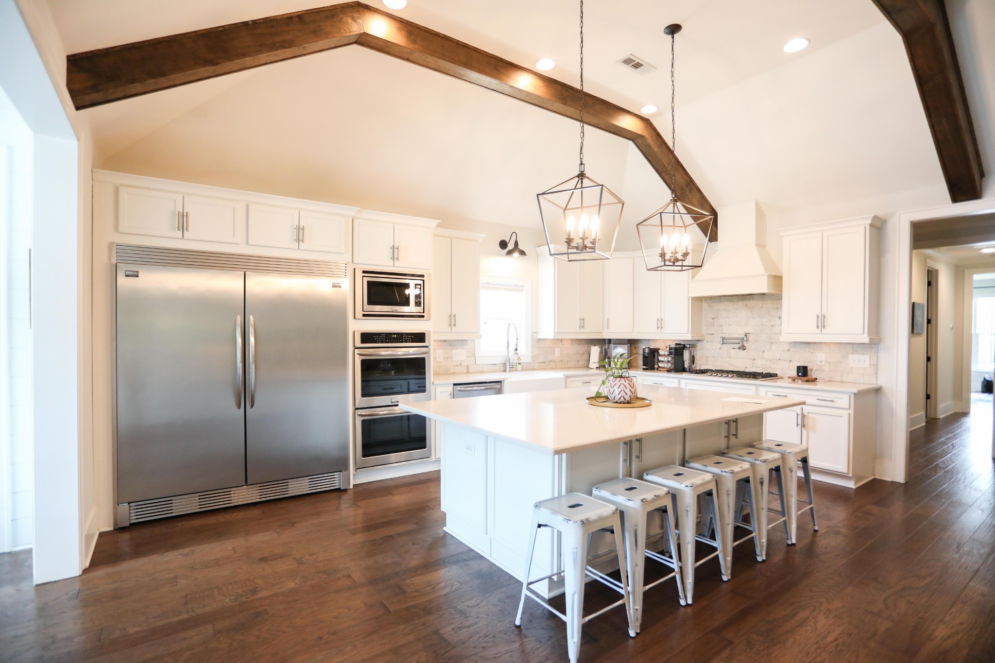 119 Vanner Road Mount Juliet, TN 37122 - Photo 10 of 44 a kitchen with stainless steel appliances a kitchen island hardwood floor and a view of living room