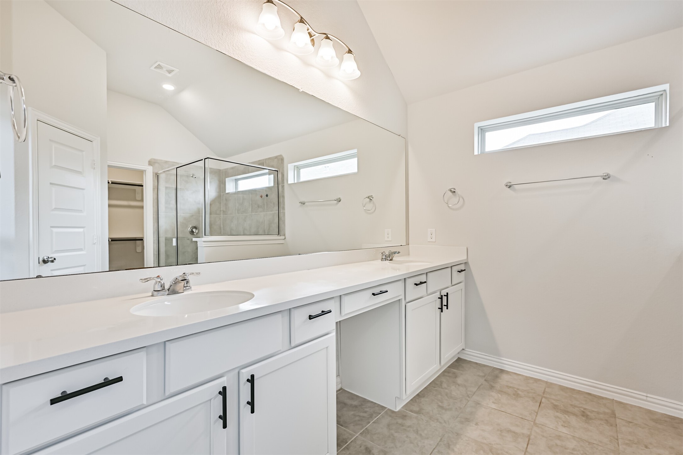 7019 Terra Drive Manvel, TX 77578 - Photo 35 of 41 a bathroom with a sink a vanity and a mirror