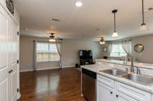218 Wainwright Drive Crestview, FL 32539 - Photo 13 of 42 a kitchen with sink refrigerator and window