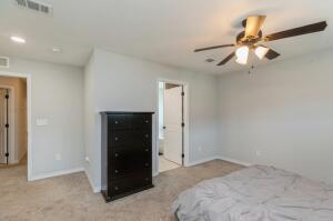 218 Wainwright Drive Crestview, FL 32539 - Photo 16 of 42 a bedroom with a bed and a ceiling fan
