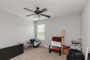 218 Wainwright Drive Crestview, FL 32539 - Photo 24 of 42 a bedroom with bed and a window