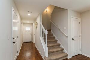 218 Wainwright Drive Crestview, FL 32539 - Photo 3 of 42 a view of a hallway with wooden floor and entryway